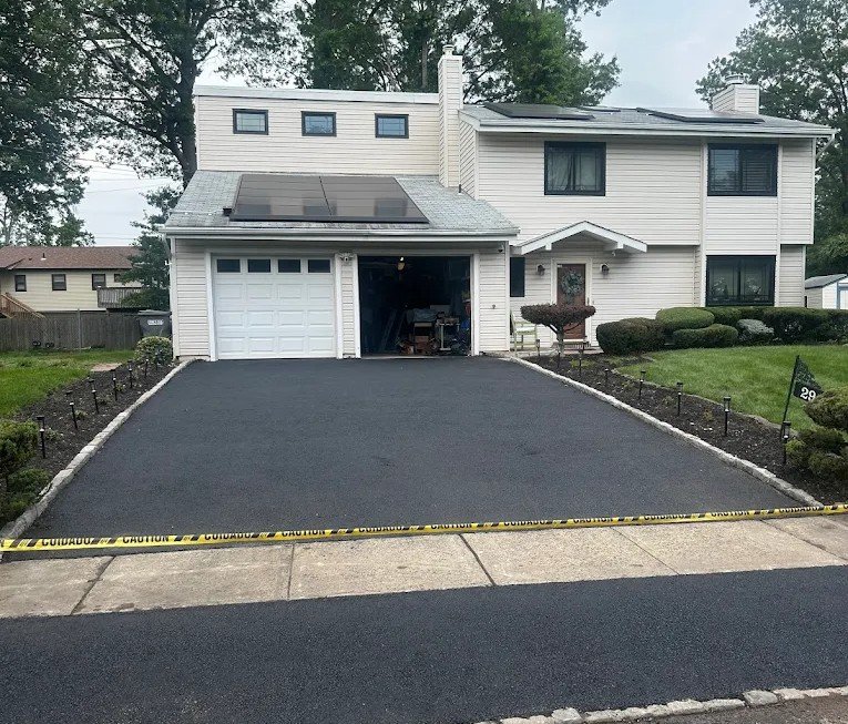 Oil and Stone vs Asphalt Driveway in Long Island: Which Is Better for Your Property?